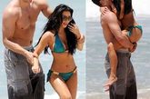 金·卡戴珊(Kim Kardashian)和新男友Kris Humphries在海滩上，金·卡戴珊穿着比基尼露出凹凸有致的身材，和男友海滩“嬉水”。和男友在一起，悬殊的身高差让人惊讶。
