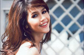 有“洋娃娃美人”之称的泰国女星Chompoo成为新一期《Lisa Weekly》杂志封面人物。