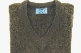 Miuccia Prada曾经在她的设计中更换新标签，定为：Miuccia Prada Made in系列。其中每件商品都附有“原产国”的标识，使消费者在购买的时候就知道这是在哪国制造和在哪里获取灵感。讽刺的是，这个系列中并没有中国系列
“Made in Peru”羊驼毛V-neck冷衫 
HK$5,950