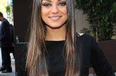 Mila Kunis身穿Balmain亮相2011年MTV电影大奖颁奖礼（2011 MTV Movie Awards）。