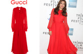 Eva Mendes 穿了一条Gucci的红色雪纺长裙，与她的肤色十分相称。
这条裙子在Net-A-Porter网站的售价是$2,695美金.