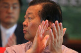 全国政协委员、香港新闻工作者联合会会长张国良在论坛开幕式上。（图片来源：凤凰网华人佛教  摄影：丹珍旺姆）