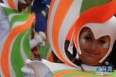 8月28日，在英国首都伦敦的诺丁山地区，一名女孩参加巡游。当日，一年一度的伦敦诺丁山狂欢节开幕。诺丁山狂欢节是世界上规模最大的狂欢节活动之一，每年都吸引上百万人参与。新华社发（高塔姆摄）