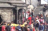 尼泊尔人对死亡有着独特的理解。他们相信，一个灵魂有8400万次生命，每经一次轮回都会提升一个层次。因此，死亡并不是件令人悲痛的事。这些观念在尼泊尔的丧葬文化中表现尤为突出。尼泊尔人至今仍保留着传统的露天火葬习俗。加德满都的火葬场有几十处，最大的一处设在帕舒帕蒂神庙。神庙是座三层建筑，雕梁画栋，飞檐斗拱，横跨巴格马蒂河两岸，中间有座石桥相连。神庙下的河岸就是露天火葬场，建有几十个方形或圆形石头平台。方形台用来焚烧尸体，圆形台供死者家属祭奠亡灵。