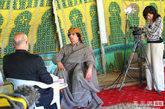 2010年7月，经过几年的准备和联络，凤凰卫视评论员阮次山一行终于得以前往利比亚对利比亚“一号人物”卡扎菲进行专访。