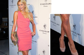 对时尚具有高敏感度的Paris Hilton，水粉色单肩连衣短裙，叠加的线条褶皱质感十足，裸色圆头高跟鞋凸显这位时尚女王的搭配功力。
