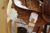  2011中国（上海）国际马业展览会上印花的马鞍配上银色的装饰显得非常华丽。