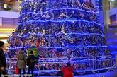 沈阳一商场内，由数百个自行车车轮拼成的圣诞树格外夺人眼球。