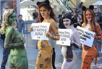 美女游街做慈善成时尚 人体彩绘扮野兽宣传